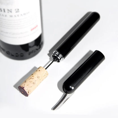 Pop the cork wine opener